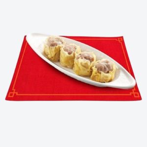 A dish with 4 pieces of Fried Pork Siomai on a red napkin