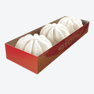 3 pieces of Siopao inside of a red box