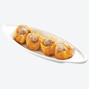 4 pieces of Siomai served inside the curved shaped white dish