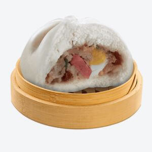 Chowking Bola-bola Siopao Supreme on a wooden bowl