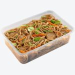 A transparent plastic box of pancit canton