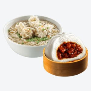 A bowl of wonton mami noodles and a bowl of Asado siopao