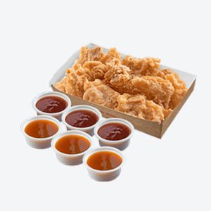 6 small bowls of sauces and a box of fried chicken 