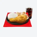 Chinese-Style Fried Chicken Lauriat on red cloth along with glass of coke